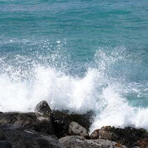 Ocean waves against rocks, Honolulu Hawaii